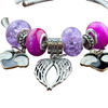 Armband Pink/ Lila/ Herz schwarz Flügel
